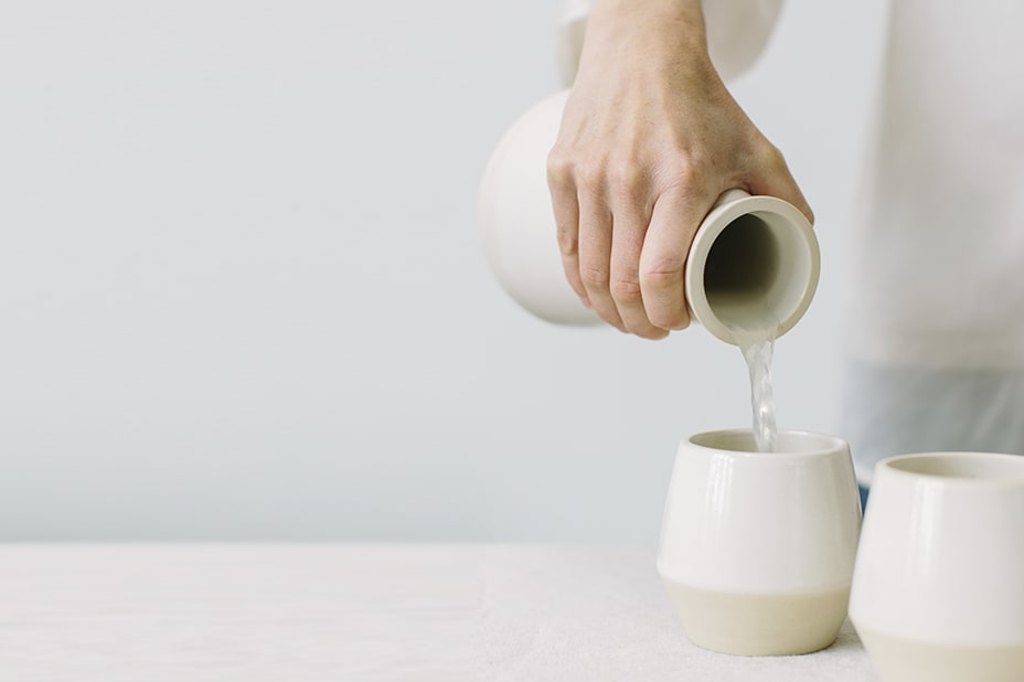 image of person pouring water